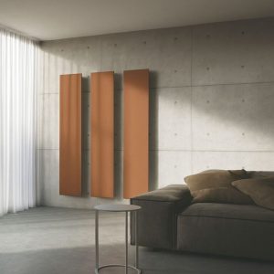 Radiadores verticales Instamat en tono Terru, diseño contemporáneo para salones modernos e interiores 2025.