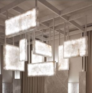 Lámparas escultóricas suspendidas del Espacio Gómez Grau por Ramón Esteve en Casa Decor 2025, diseño sensorial de piedra natural “Gruta”.