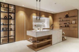 Cocina Doimo Cucine con grifo Blanco Luneoo-S negro mate e isla central de diseño contemporáneo en Casa Decor 2026