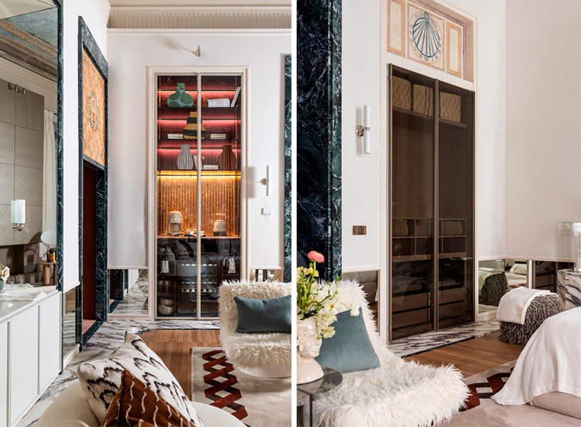 Armario a medida de DA Group y desayunador con vinoteca, iluminación integrada y revestimientos de Alvic en suite italiana Casa Decor