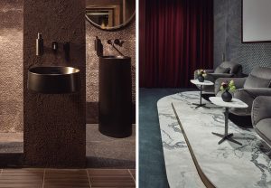 Baño minimalista Sensory Balance en Casa Decor con lavabo de piedra y revestimientos en tonos oscuros para una experiencia sensorial