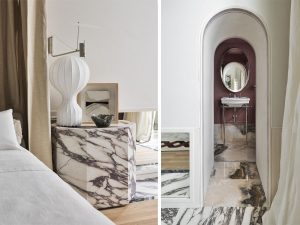 Dormitorio en Casa Decor con mesillas y suelo en porcelánico Fior di Viola efecto mármol, diseño elegante y continuo